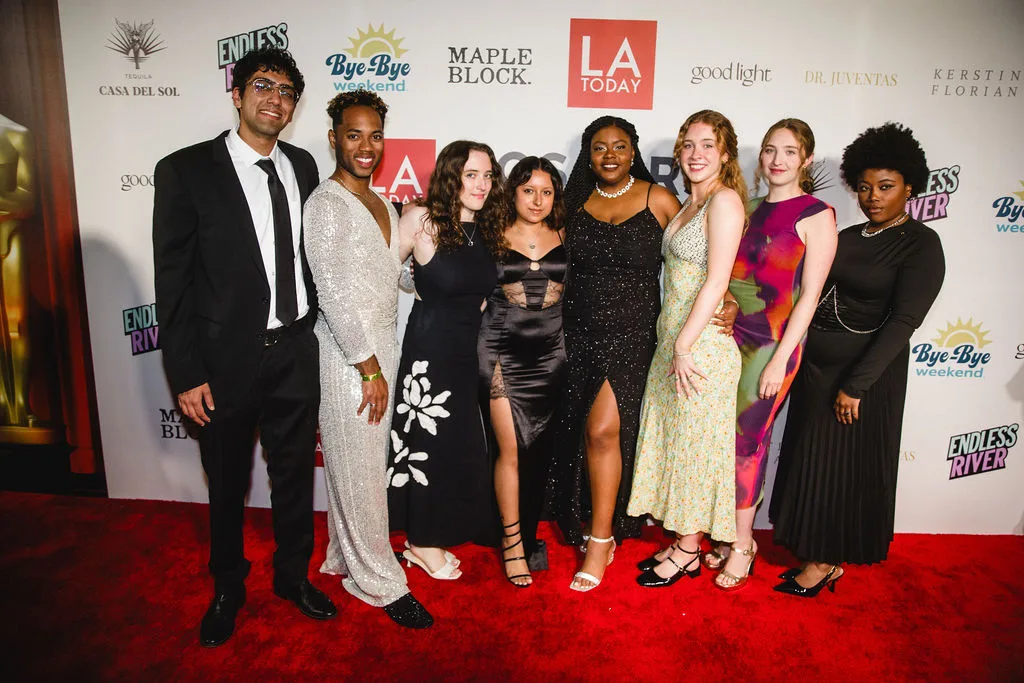 Guests on the Oscars Pre-Party carpet, with the Endless River and LA Today logos on the step-and-repeat